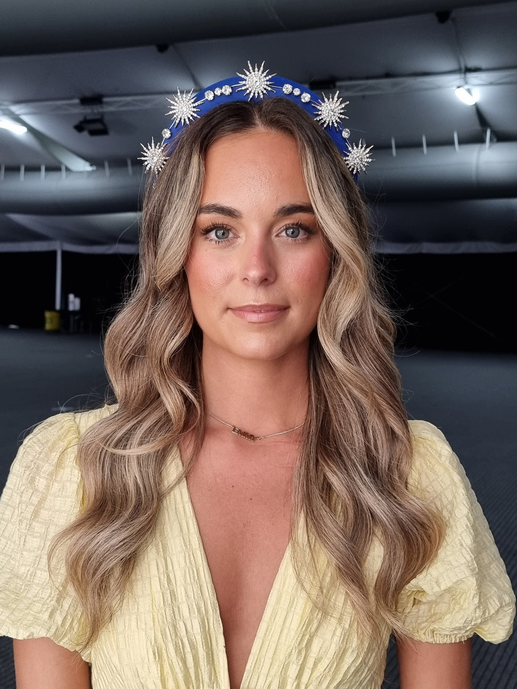 model wearing star rhinestone headband