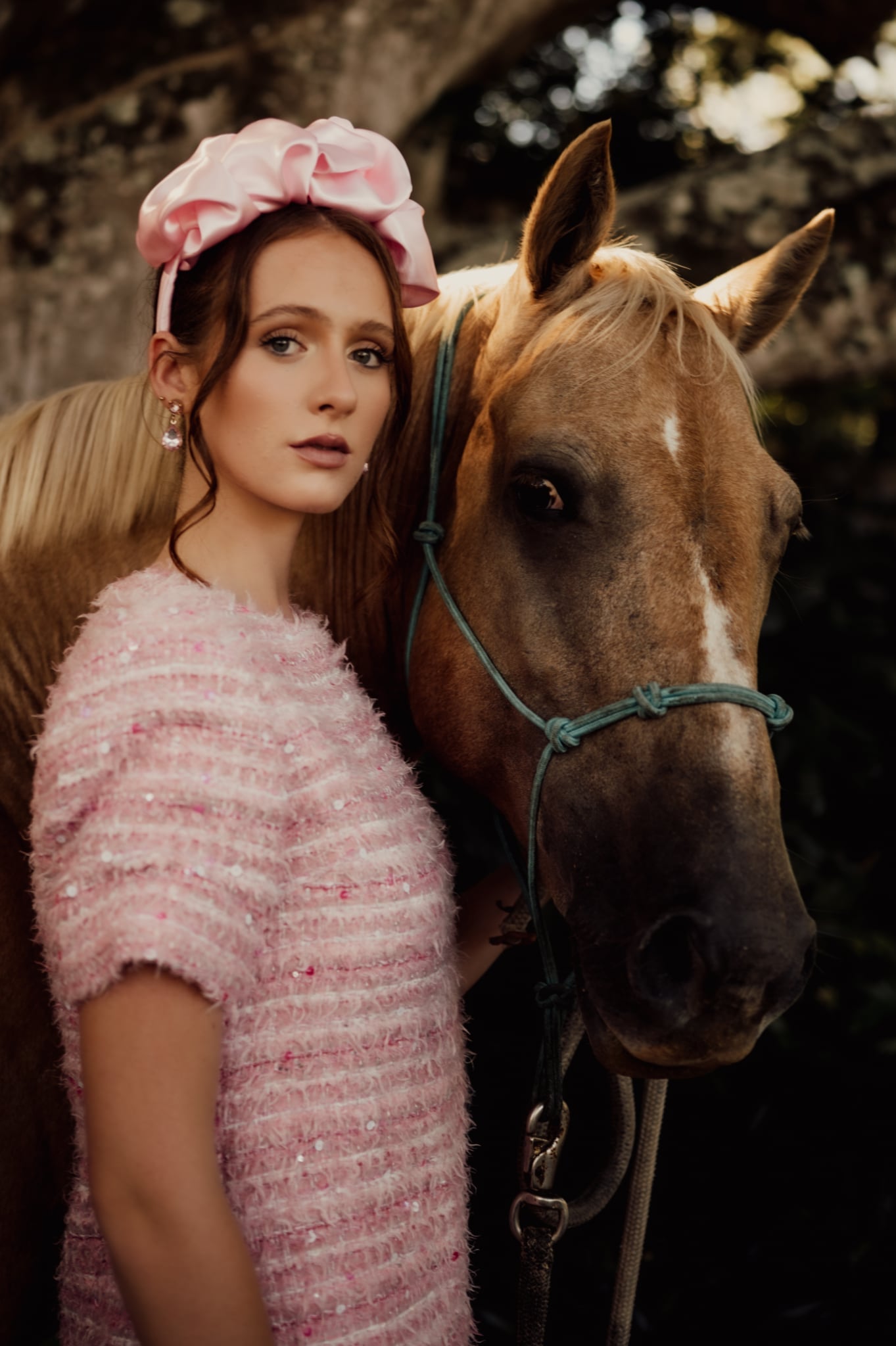 model wearing pink scrunch headband fascinator millinery