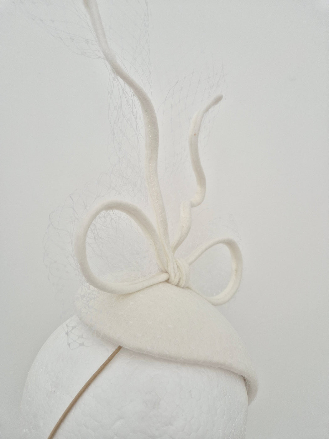 off white felt headpiece fascinator millinery close up