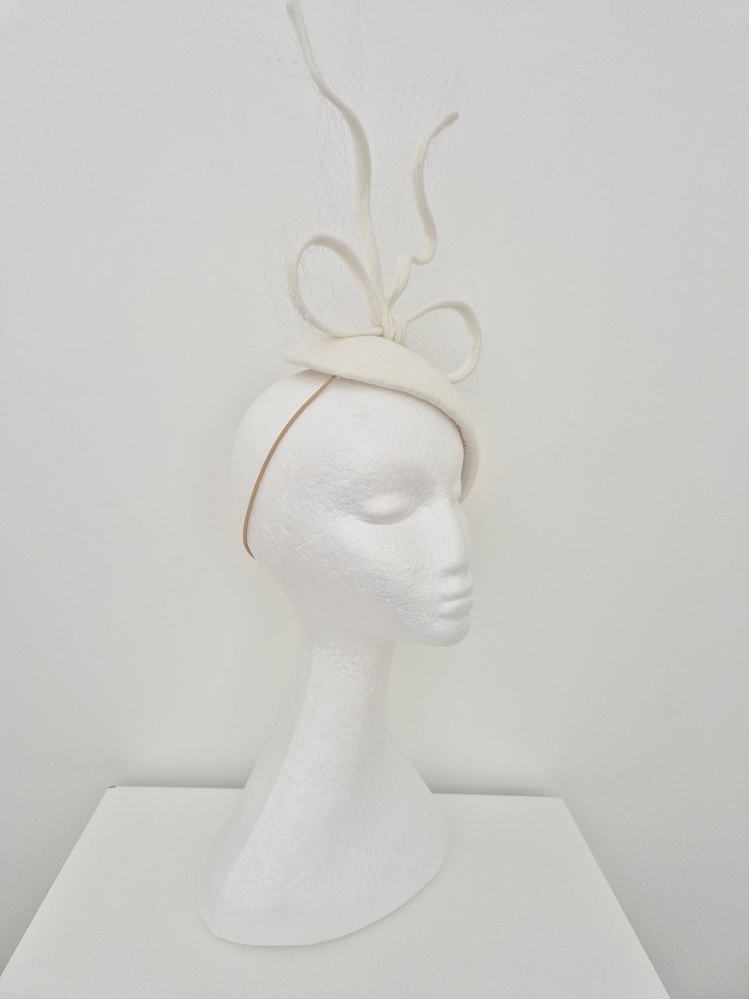 off white felt headpiece fascinator millinery side view