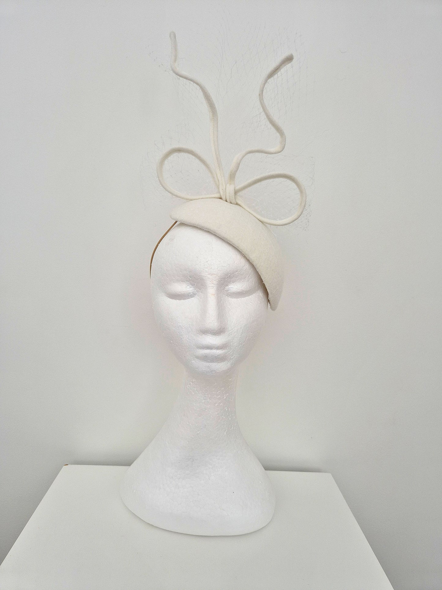 off white felt fascinator headpiece millinery front view