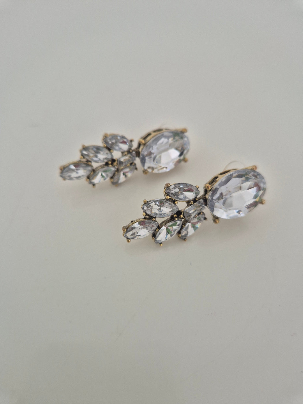 pair of clear rhinestone earings