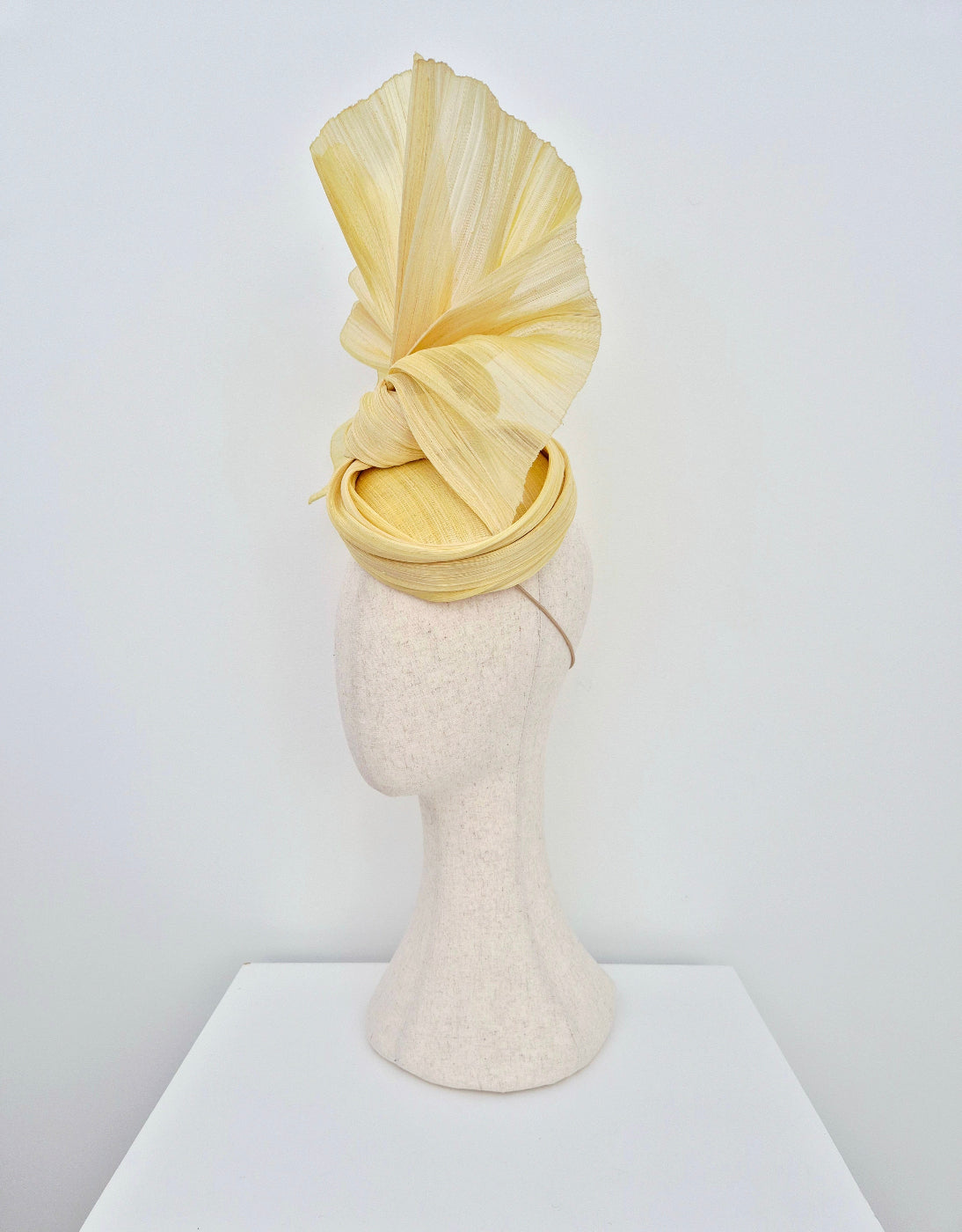 pale yellow silk abaca fan headpiece side view