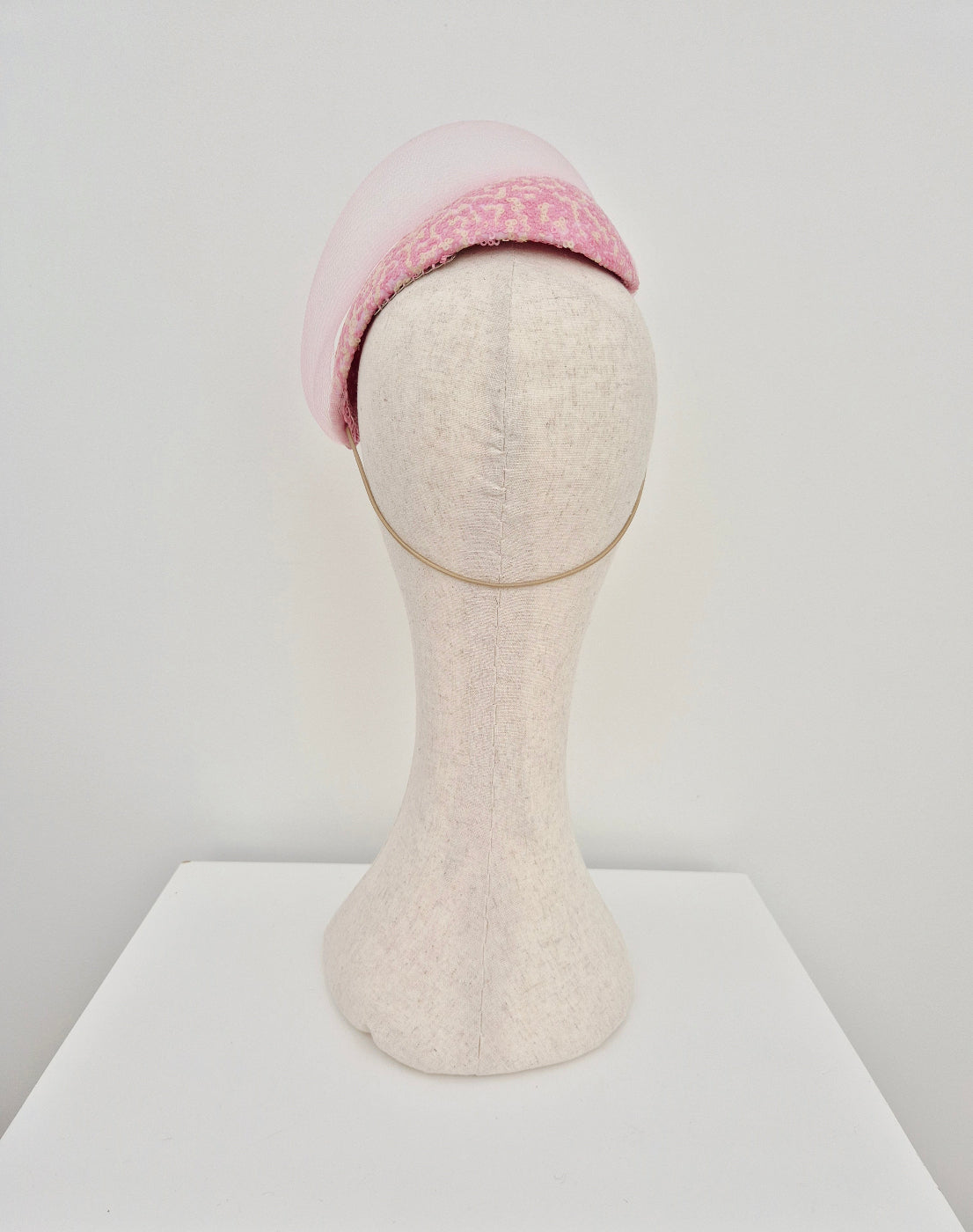 pink and cream sequin headpiece with crinoline wave back view
