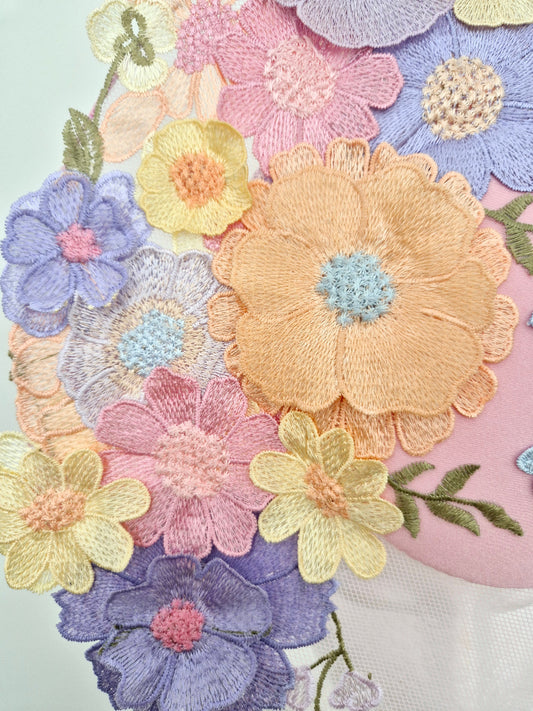 close up of lace on pink floral percher
