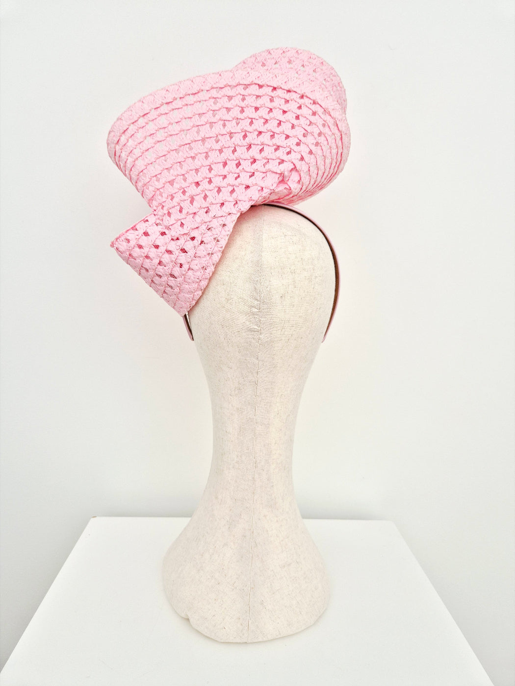 pink straw headpiece back view