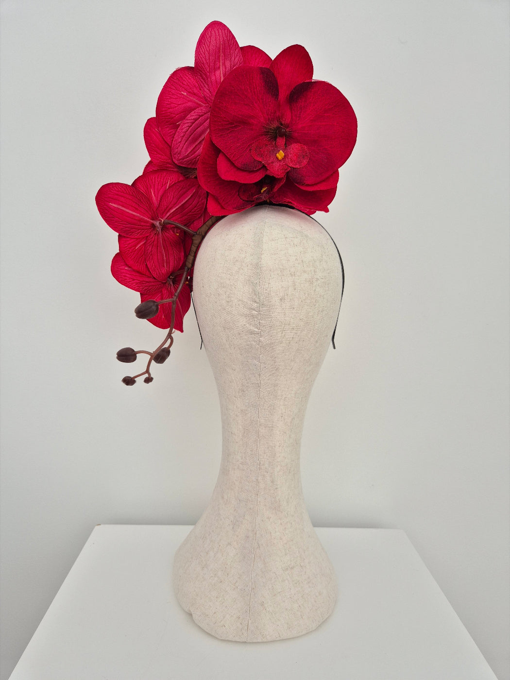 red floral headpiece orchid back view