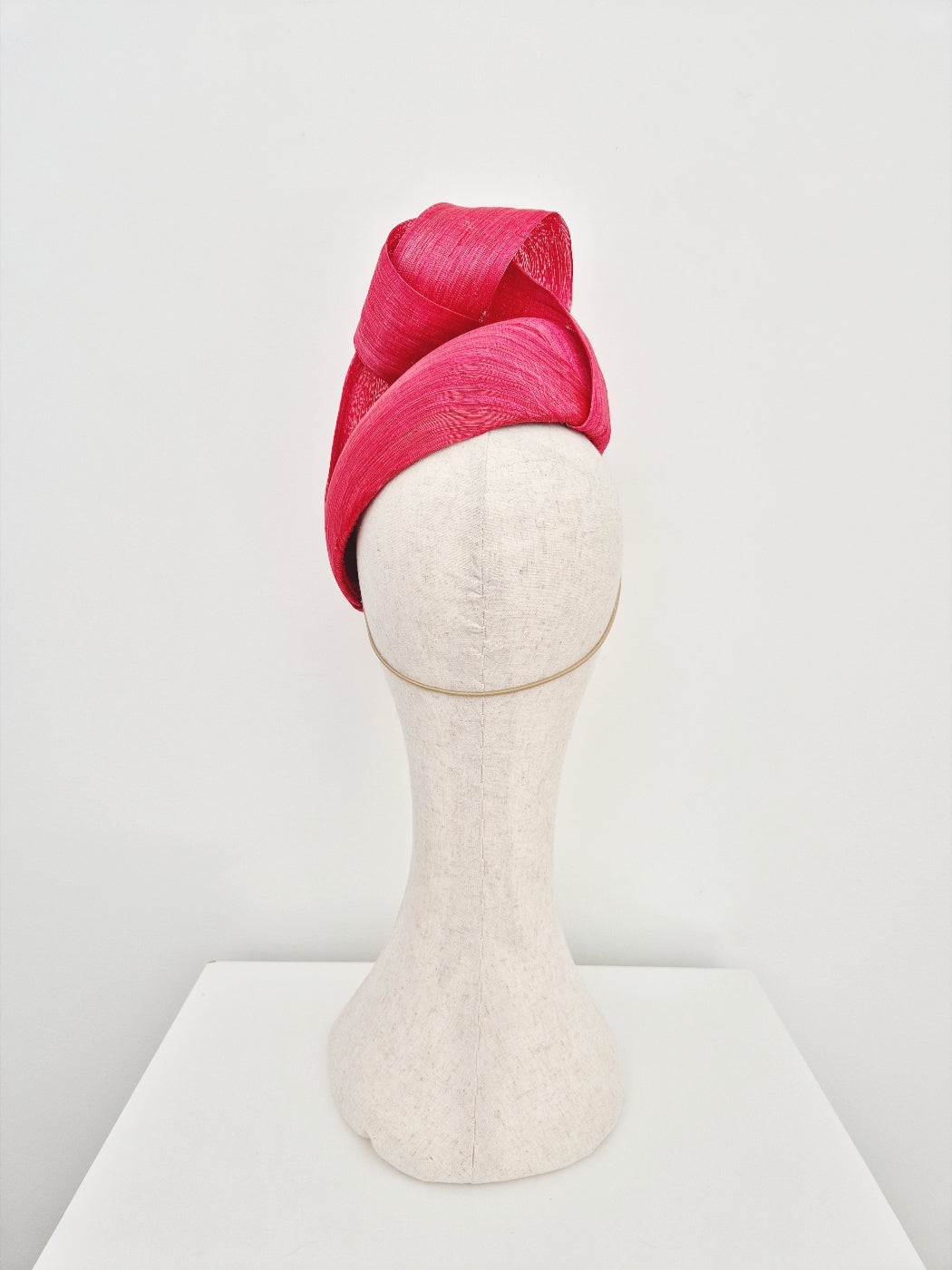 red silk abaca headpiece with top knot back view