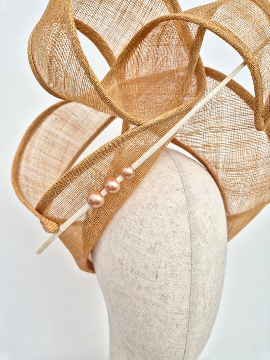sand straw free form turban style headpiece close up