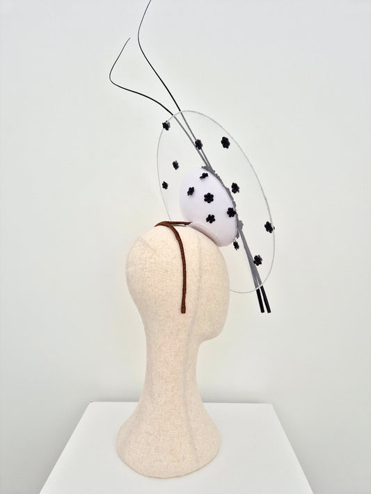 side view black and white floral percher headpiece