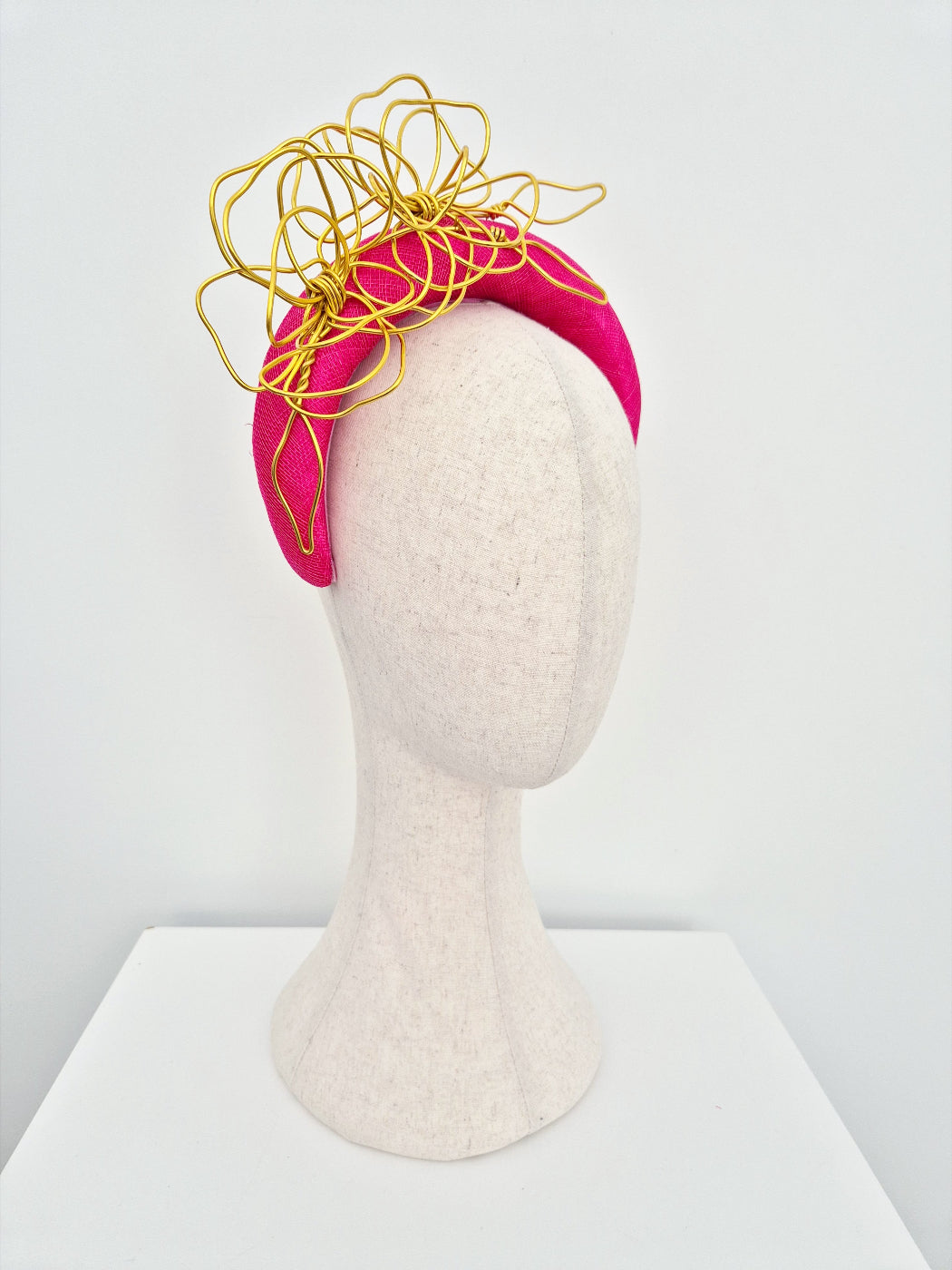 side view hot pink headband with gold floral wirework