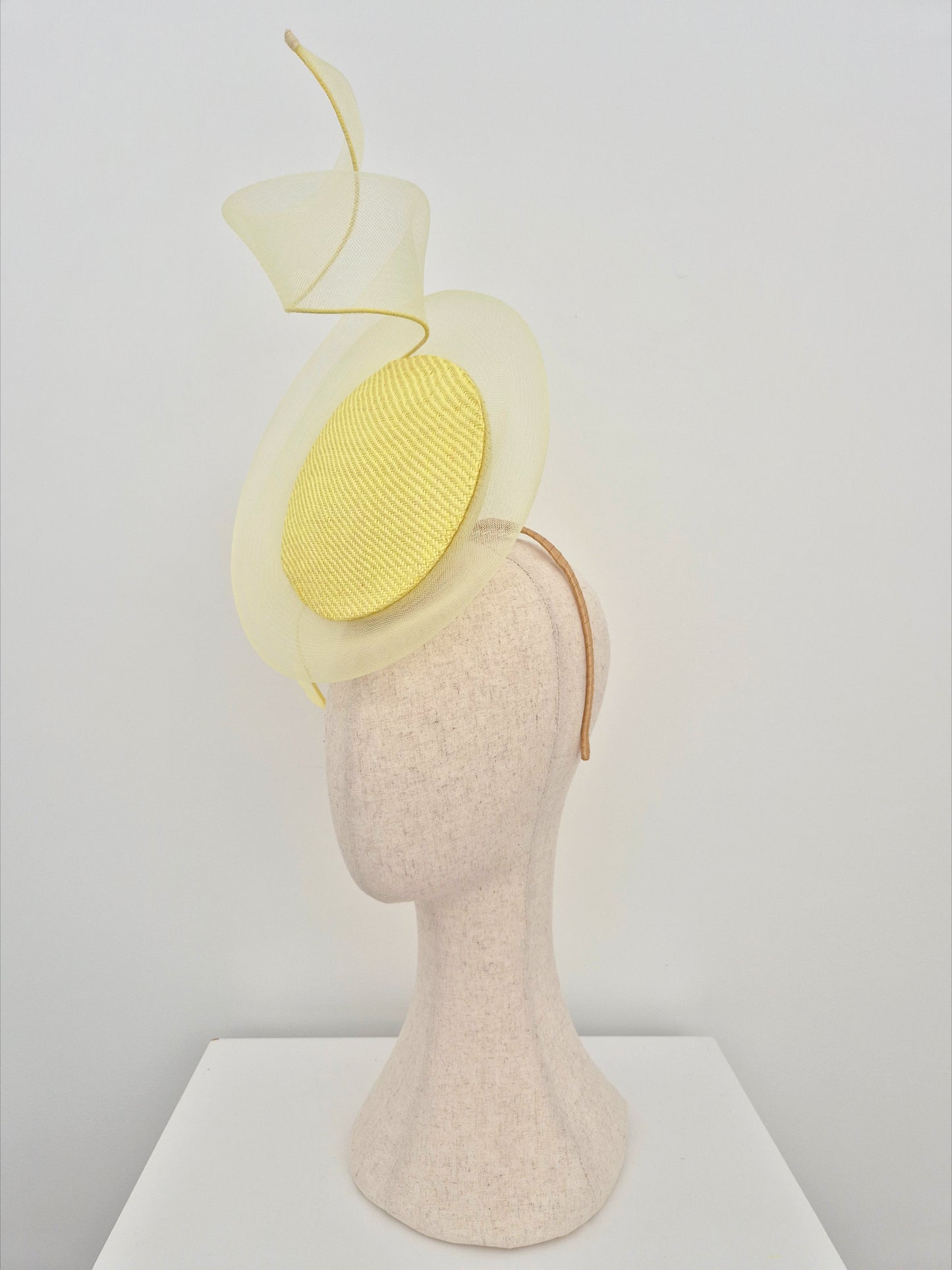 side view yellow straw percher headpiece