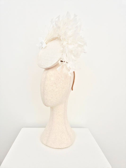 white straw percher headpiece with feathers side view
