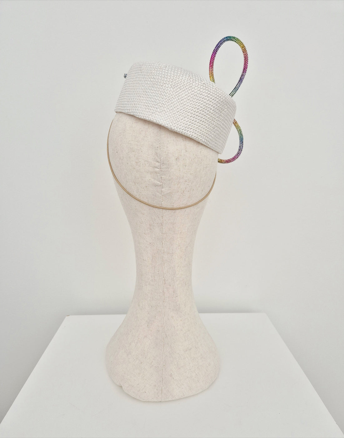 white straw pillbox with rhinestone bow back view