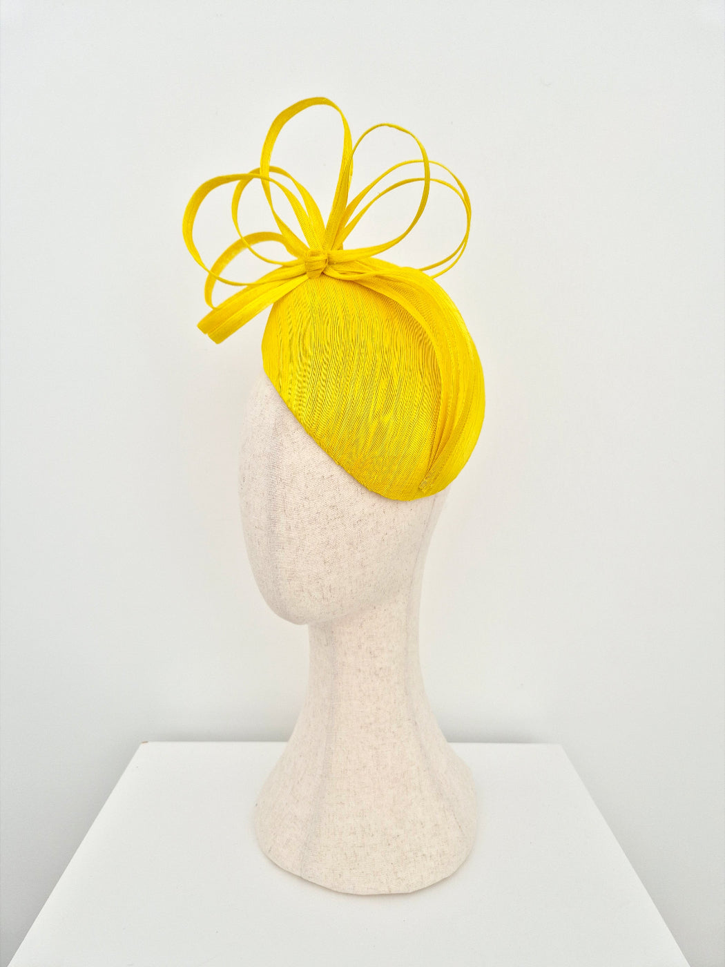yellow silk abaca headpiece with bow side front