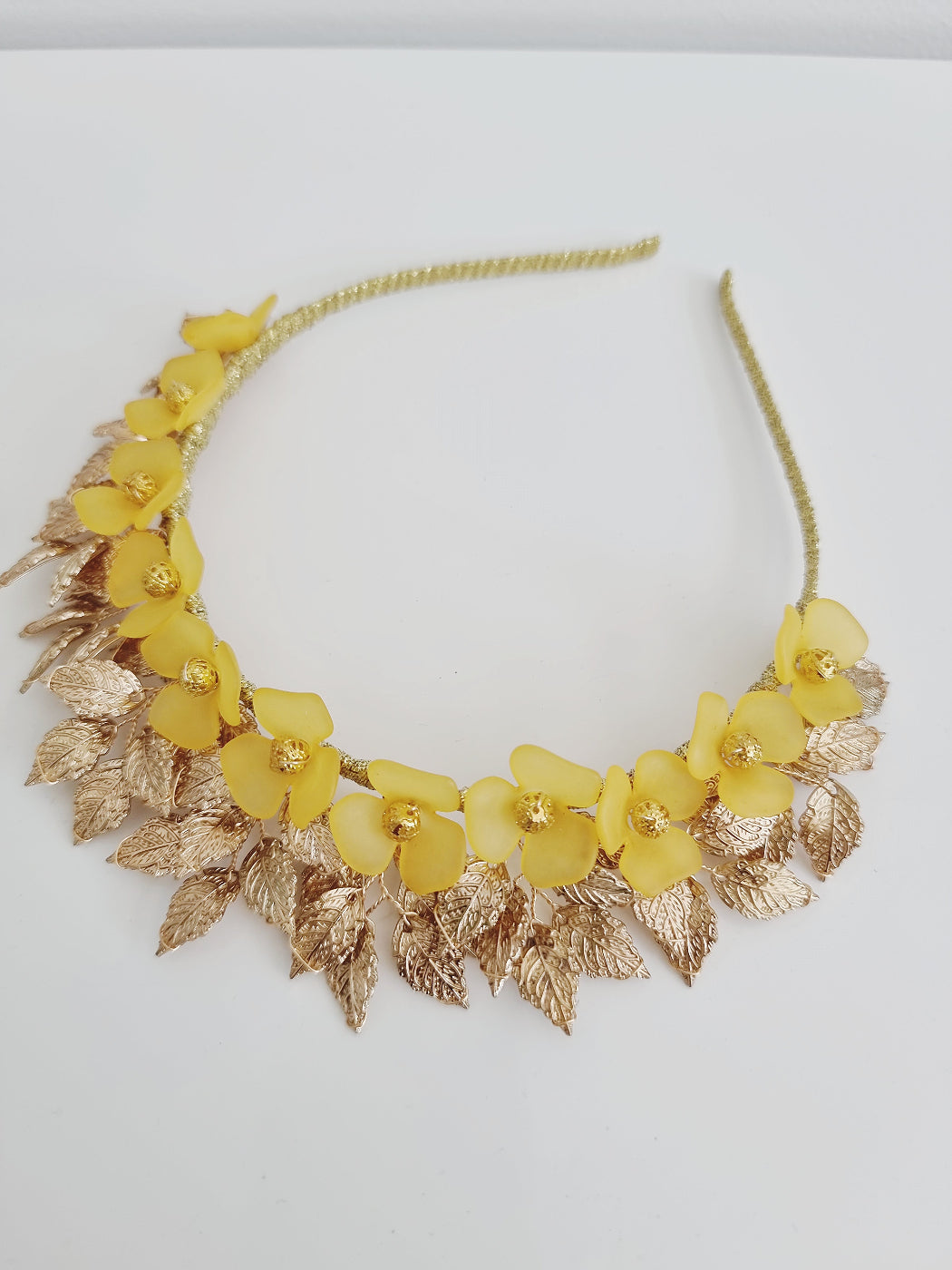 flat lay yellow and gold floral headband