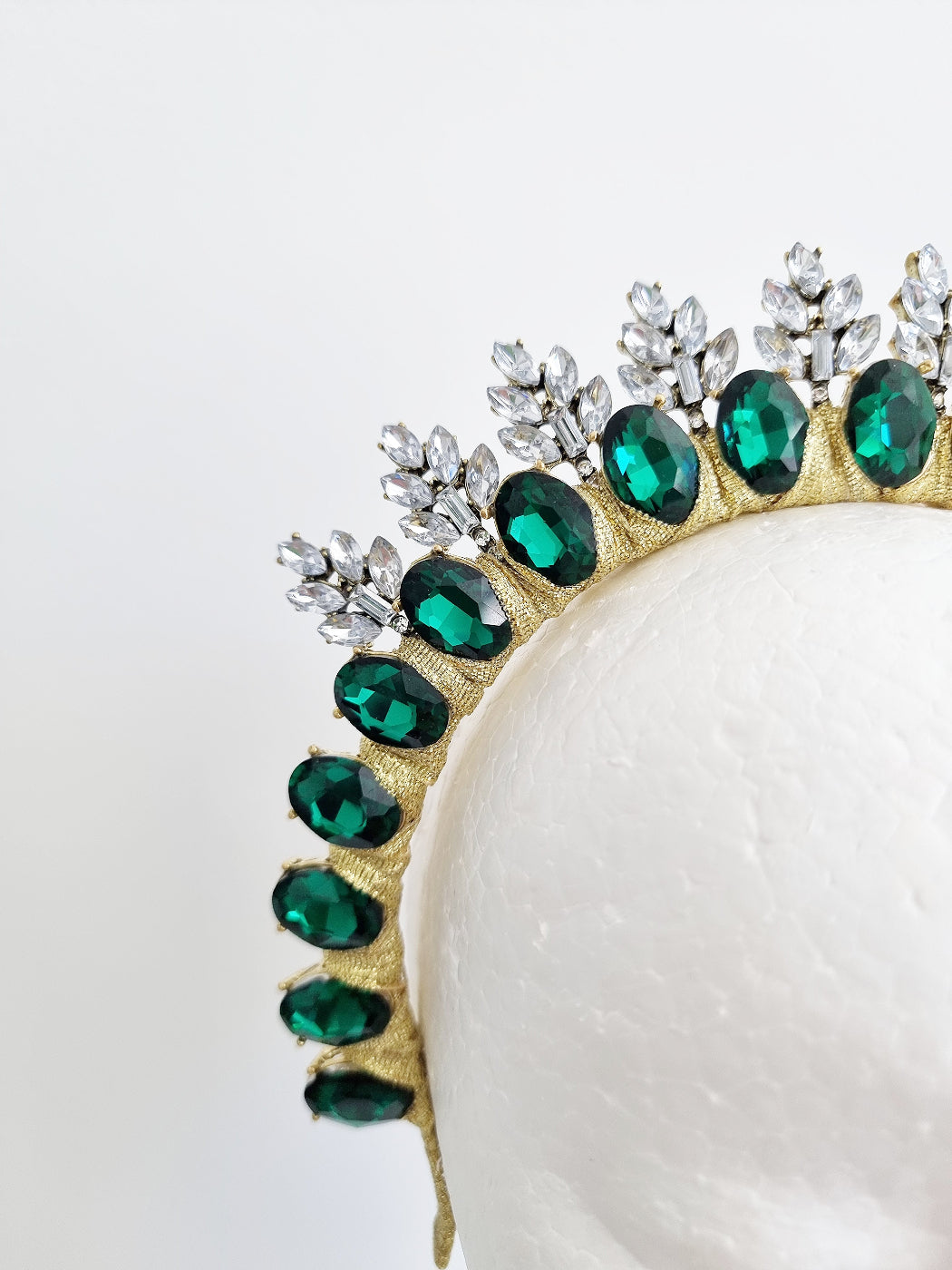 green rhinestone headband close up