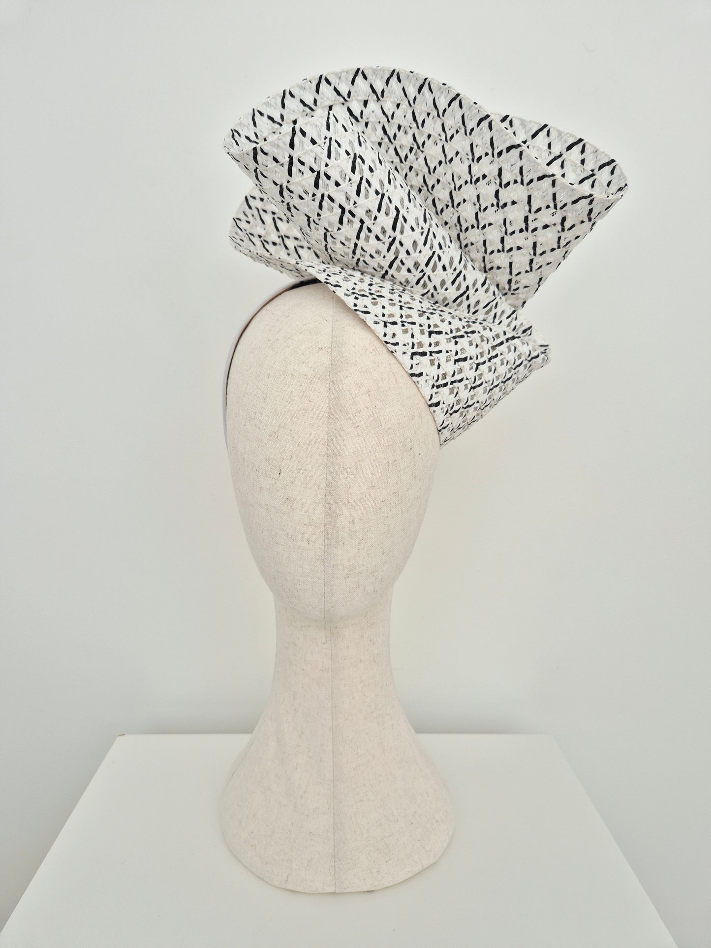 Miss Tara. Womens braided straw headpiece in Black and white