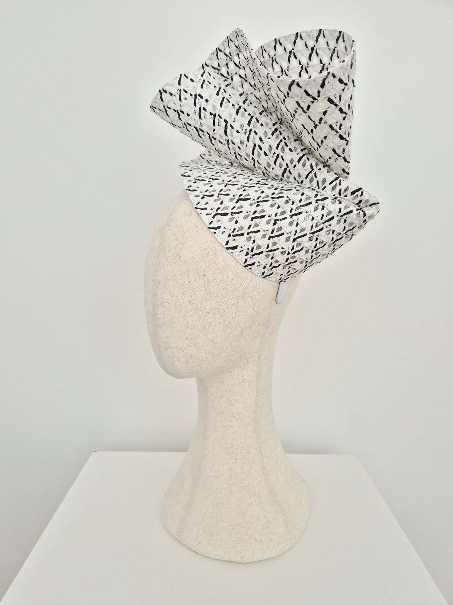 Miss Tara. Womens braided straw headpiece in Black and white