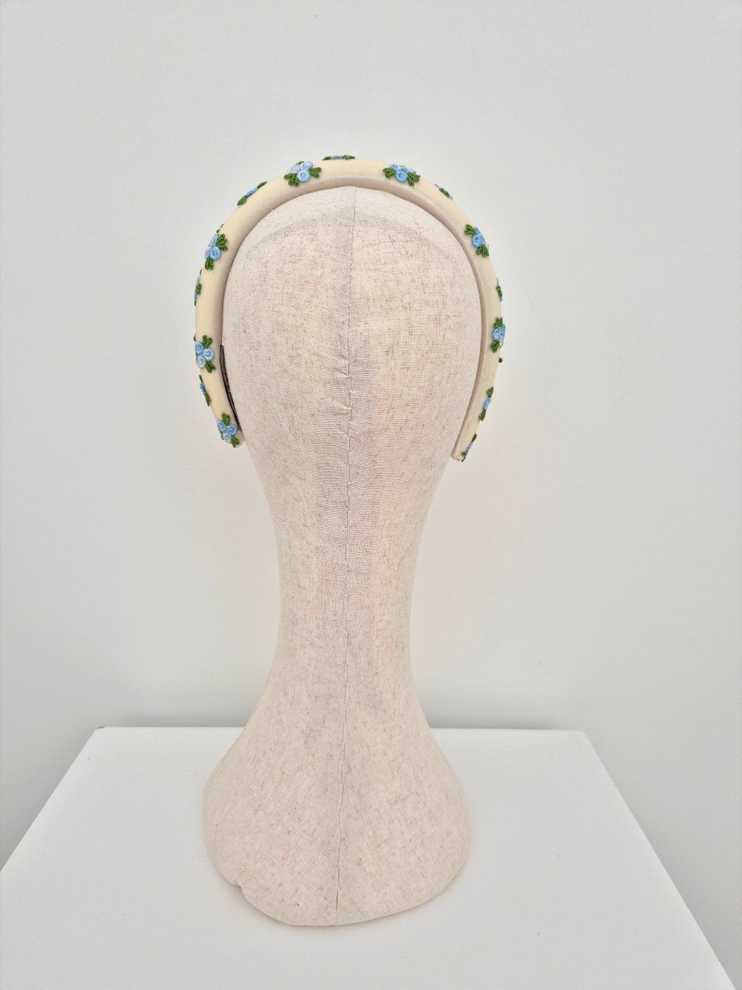 ivory velvet headband with blue embroidered rosebuds back