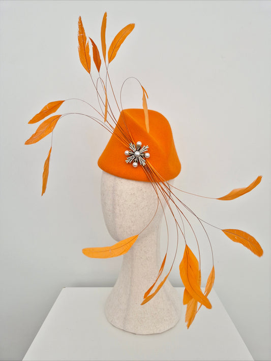 Miss Hope. Womens Orange wool felt headpiece with feathers