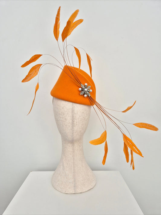 Miss Hope. Womens Orange wool felt headpiece with feathers
