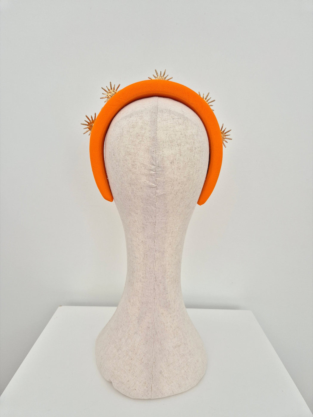 back orange headband with gold stars