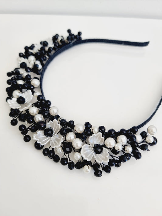 black and white pearl headband flat lay