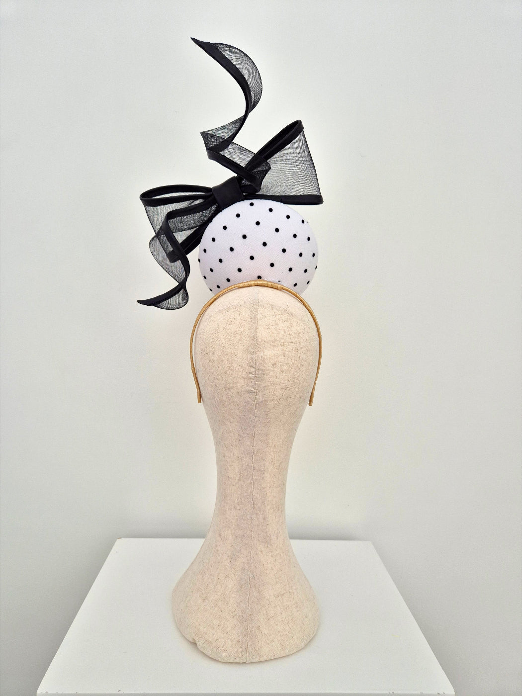 black-and-white-polka-dot-headpiece-with-bow-back-view