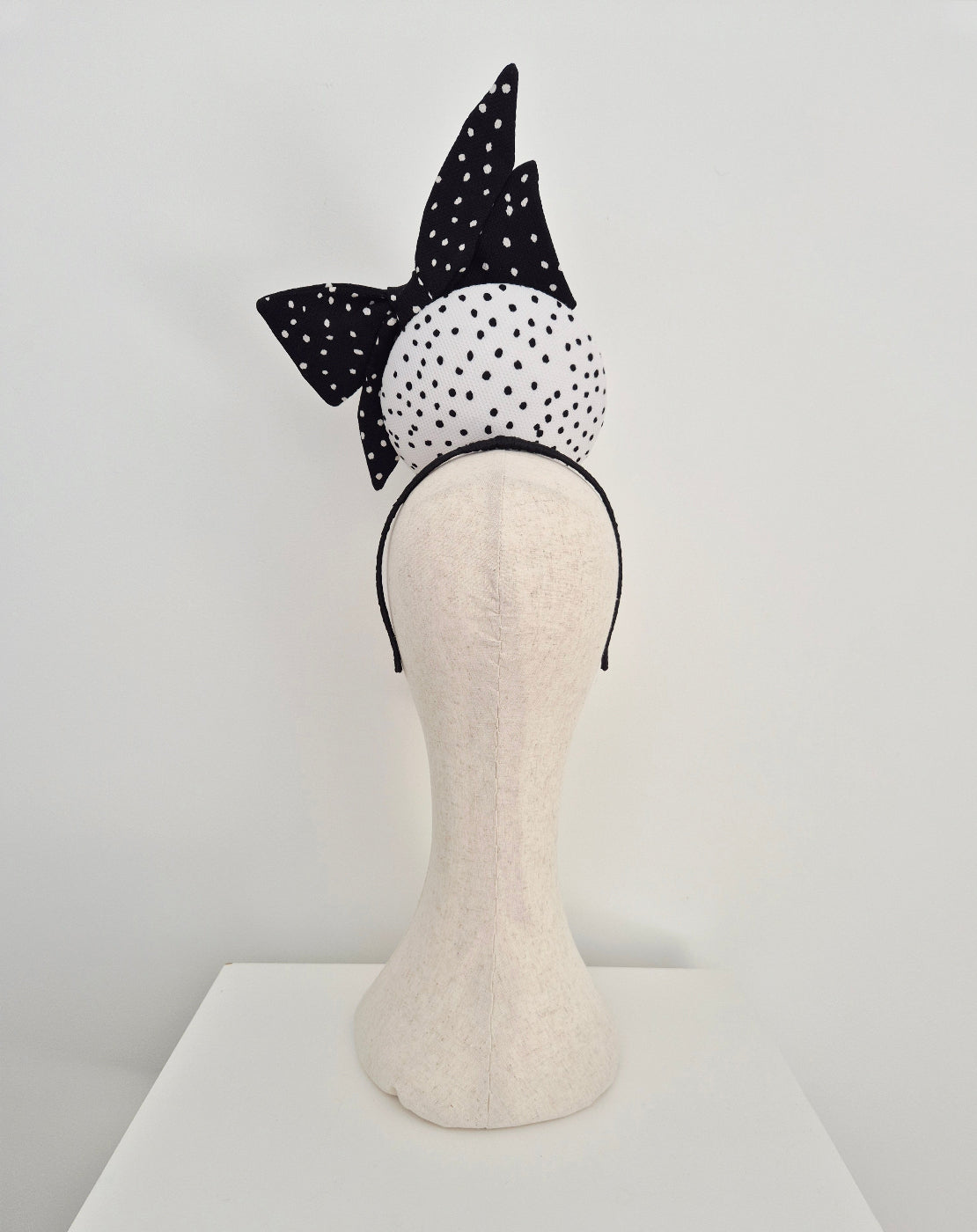 black and white polka dot percher with bow back view