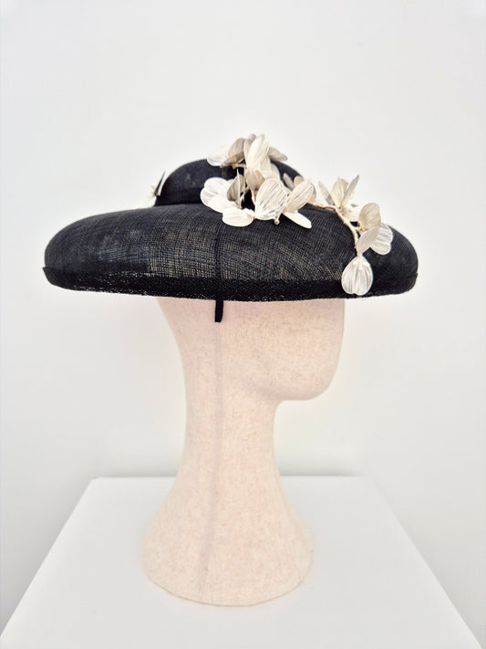 black dior style hat with silver white flowers side front