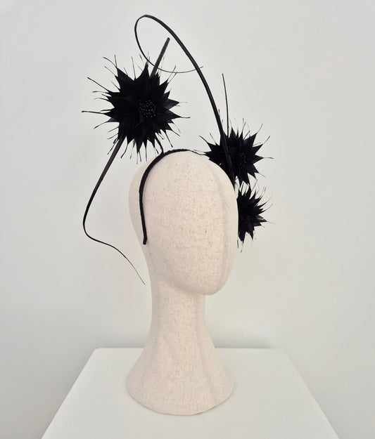 black feather flower headpiece side on
