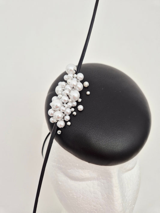 black leather button headpiece with pearls close up