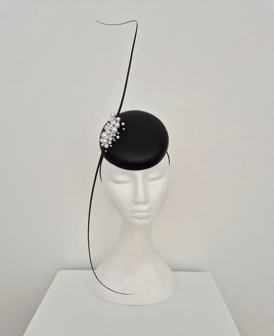 black leather button headpiece with pearls and quills