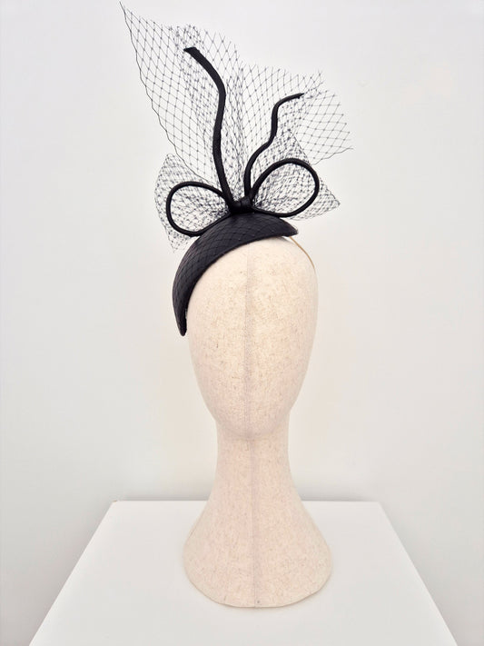 black leather headpiece with bow