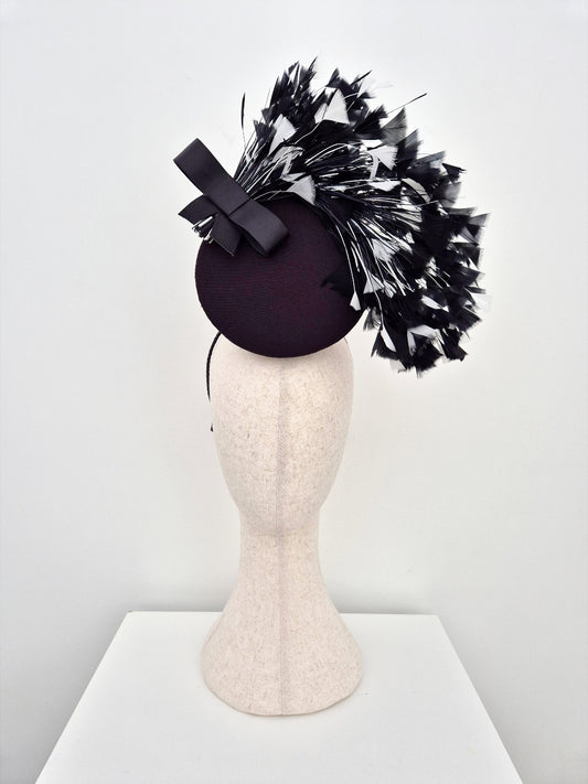 Black percher headpiece with black and white feathers