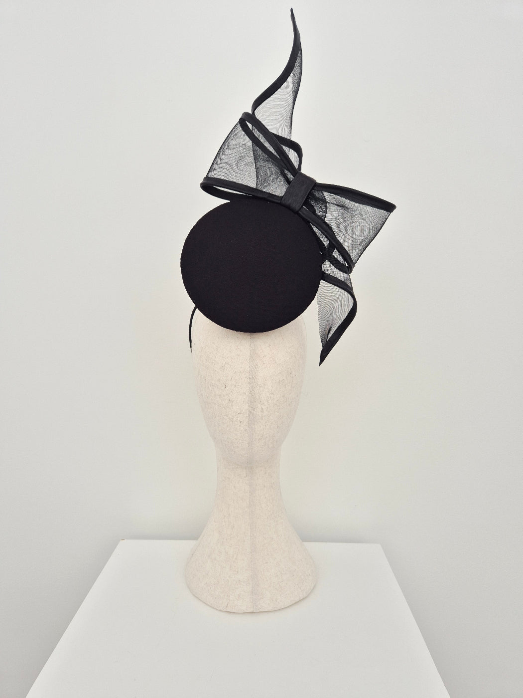 black percher with bow