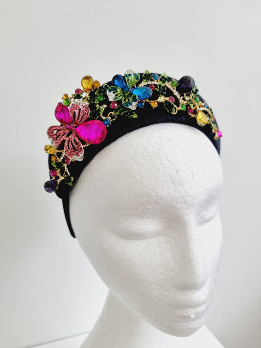 black silk headpiece with floral rhinestone detail close up