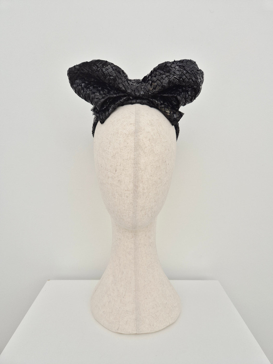 black vintage pillbox worn with bow up