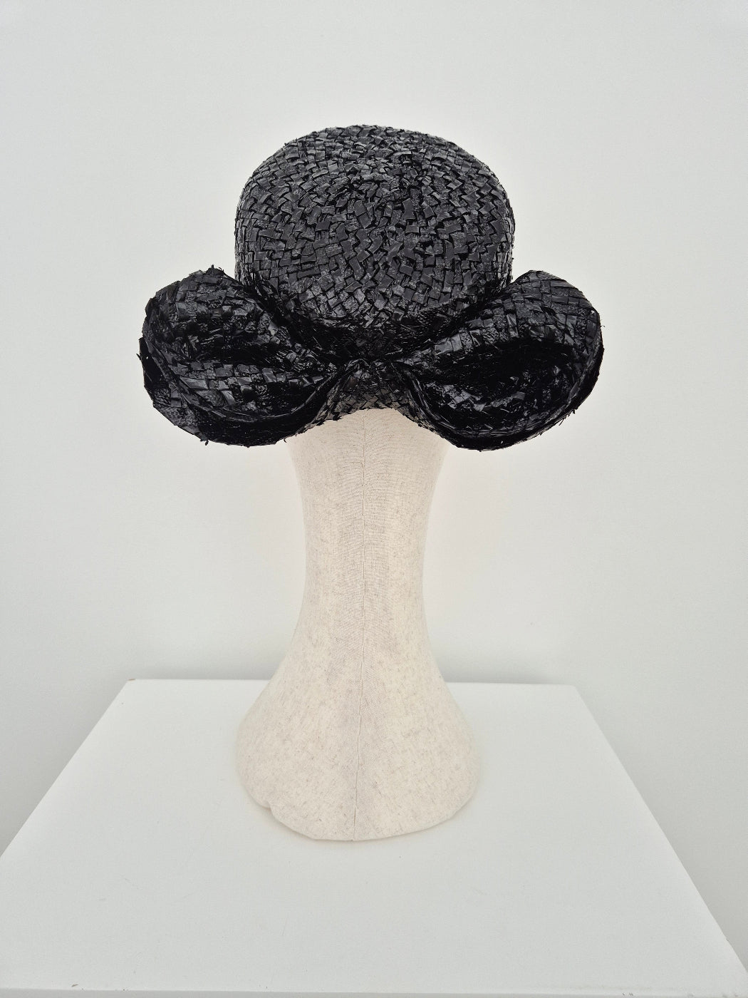 black vintage straw headpiece with bow back view