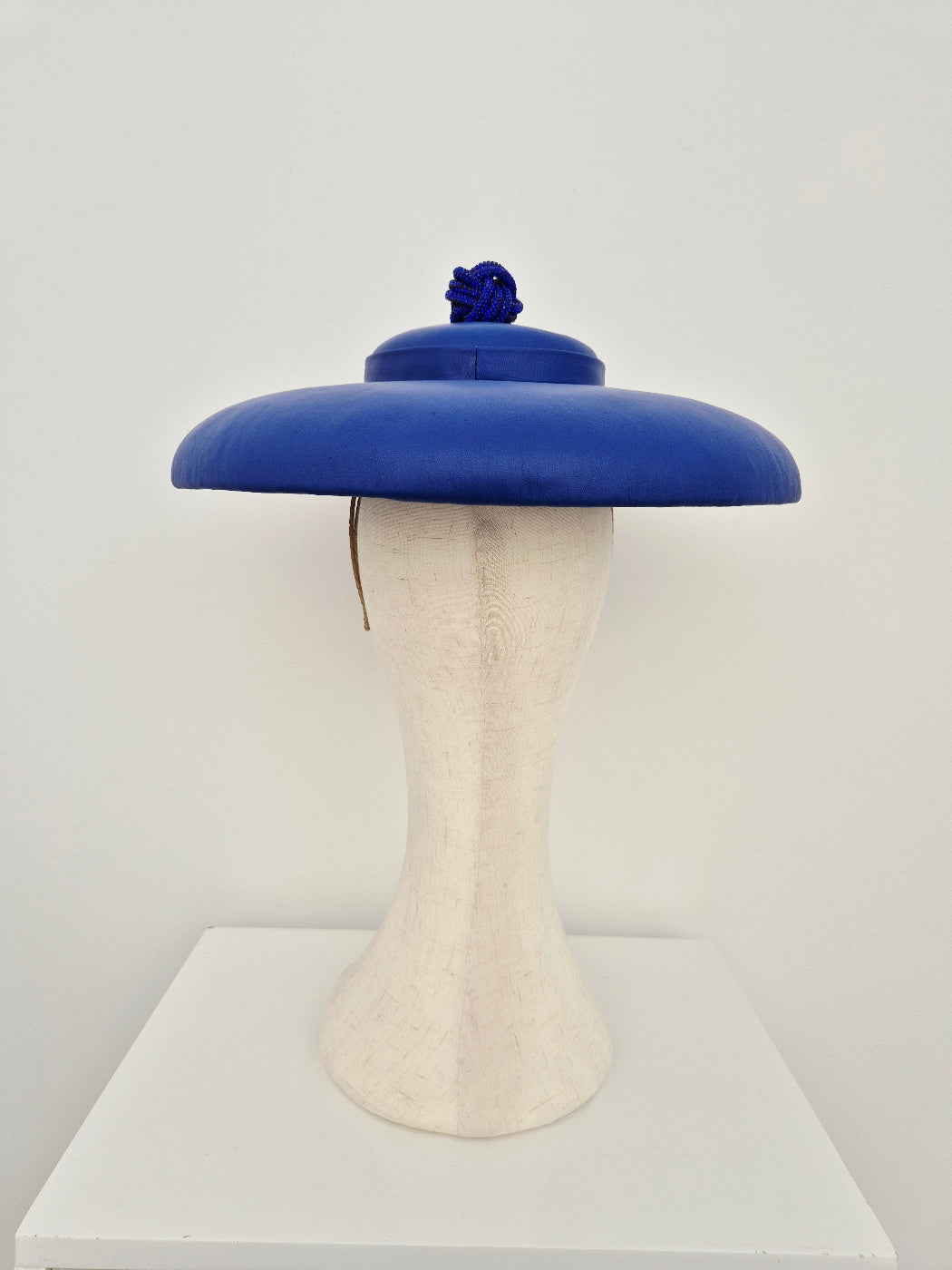 Blue leather hat with rhinestone ball back view