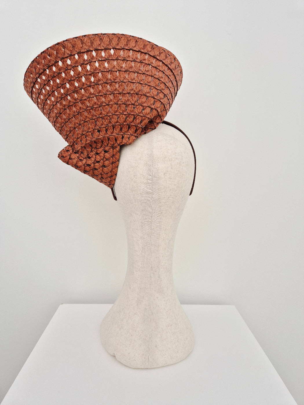 brown straw headpiece back view