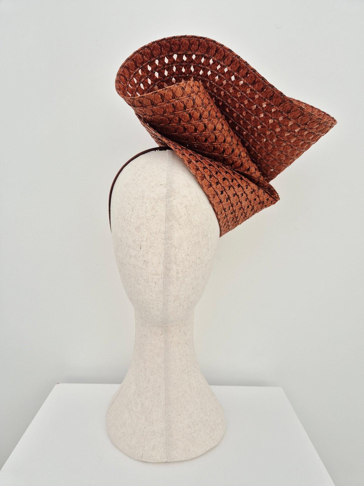 brown straw headpiece
