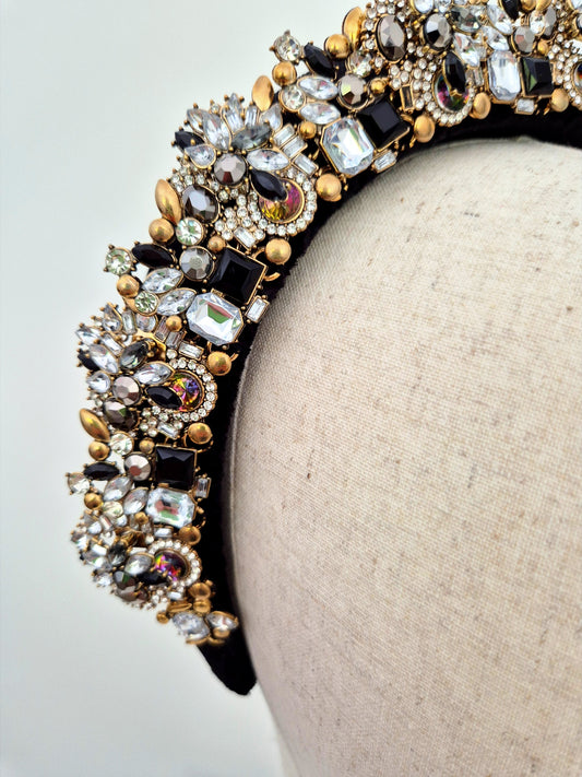 close up of black and gold rhinestone headband