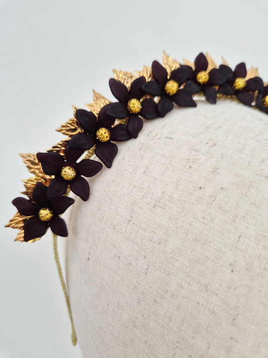 close up black floral crown