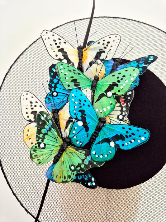 close up butterflies on black percher headpiece