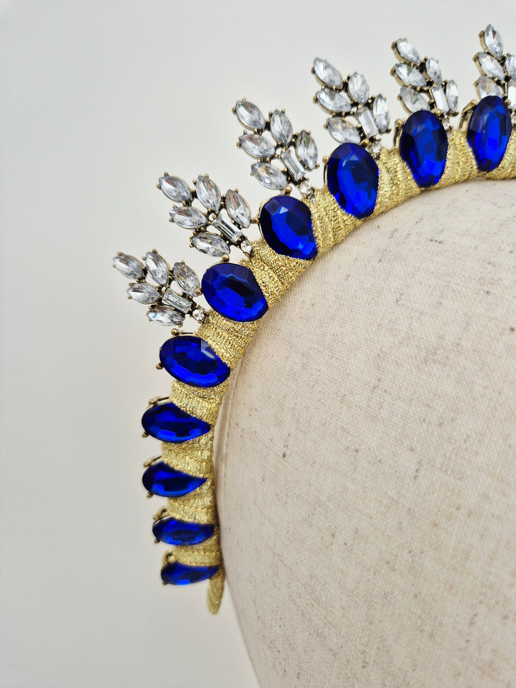 close up royal blue rhinestone crown