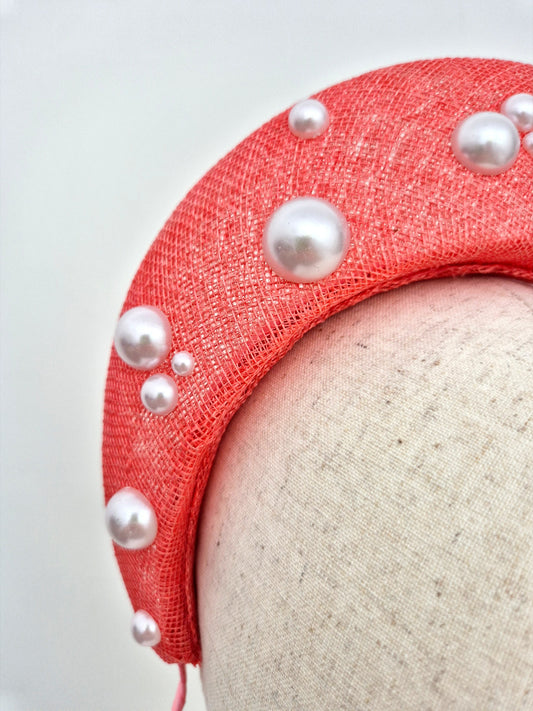 coral straw halo headpiece with pearls close up
