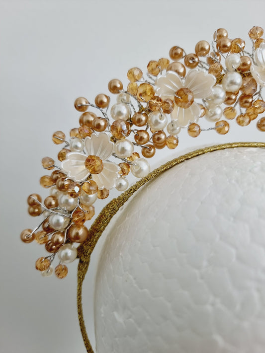 gold and white pearl headband close up