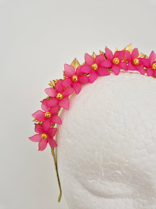 gold leaf and pink flower crown close up